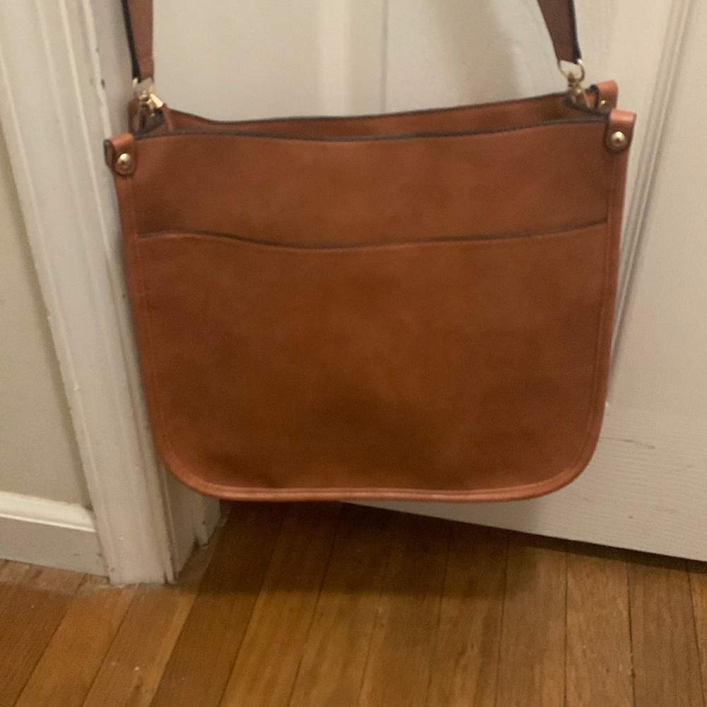 Brand new messenger bag with interchangeable strap included